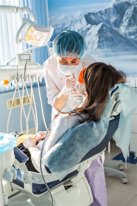 Young Woman Getting Dental Treatment Dental Treatment Dental