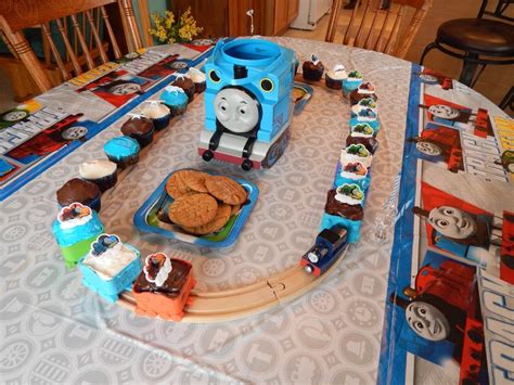 I've never watched thomas the train on tv so when i had an inquiry for thomas cupcakes, i was stumped. Thomas cupcake train. | Thomas cupcakes, Cupcakes, Thomas