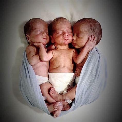 aww these cute identical triplets are one in 200 million as they were born at the same time