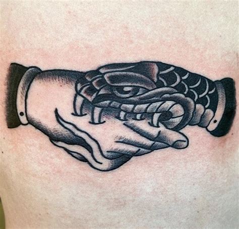 12 Best Snake Bite Tattoos That Will Shock You Petpress