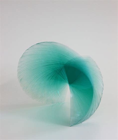 Artist Niyoko Ikuta Uses Layers Of Laminated Sheet Glass To Create Spiraling Geometric