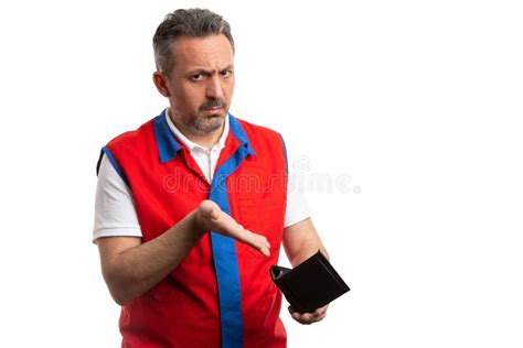 Supermarket Employee Making Confused Expression And Gesture Stock Photo