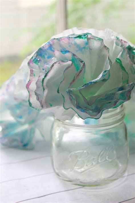 Make the décor of your house look… DIY Coffee Filter Flowers - Kim and Carrie