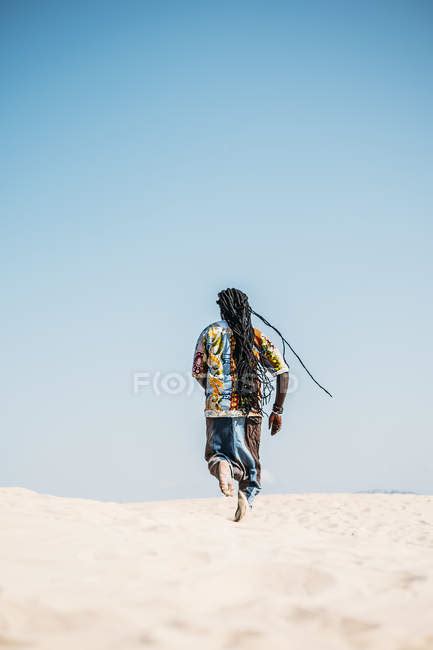 Man Walking On Desert — Colorful Posing Stock Photo 171172046