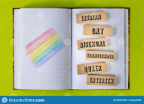 School Notebook With Hand Painted Lgbt Flag Words Written On A Wooden Block Lesbian Gay