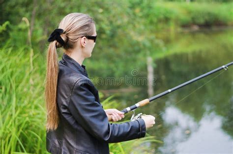 The Beautiful Young Woman On Fishing Stock Photo Image Of Caucasian
