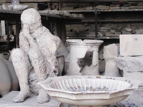 one of the famous plaster casts of a pompeiian volcano victim pompeii italy travel memories