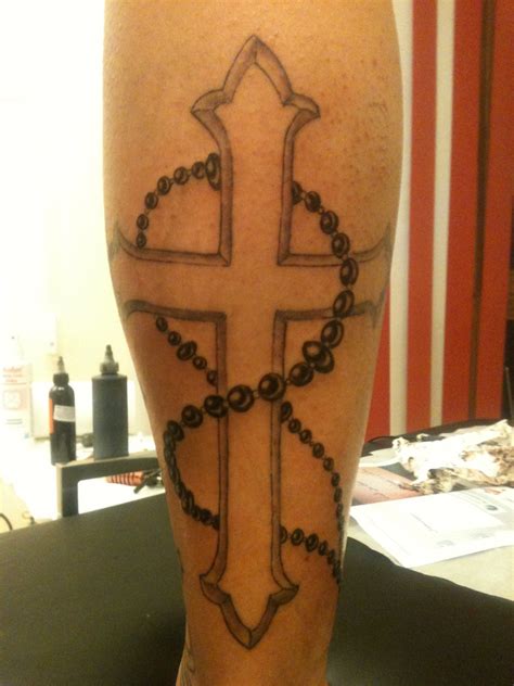 A well done tattoo is a thing of beauty that gives pleasure to the wearer. 30 Groovy Cross Tattoo Designs Ideas - TutorialChip