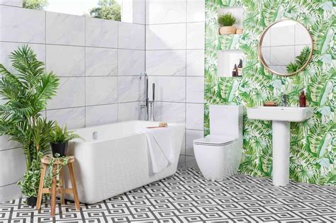 Handmade white bathroom tiles merge the classic and contemporary elements of this new traditional bathroom. White bathroom ideas that are far from boring ...