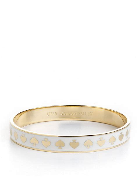 Kate Spade Idiom Bangle Bracelet In Gold Cream Lyst