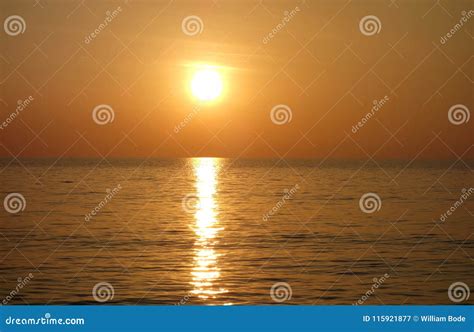 Warm Golden Tropical Ocean Sunset With Large Sun Stock Image Image Of