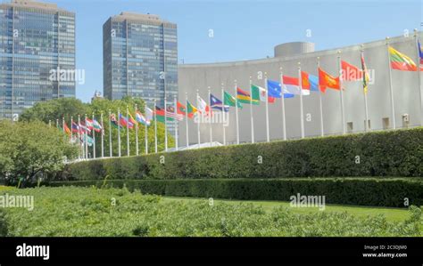 National Flags Outside The United Nations Building Ny Stock Photo Alamy