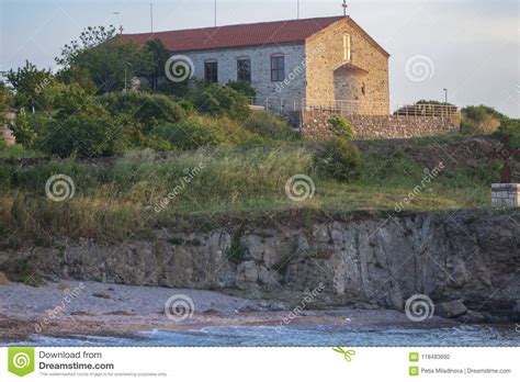 The Church On A Cliff Above The Sea Lit By The Morning Stock Photo