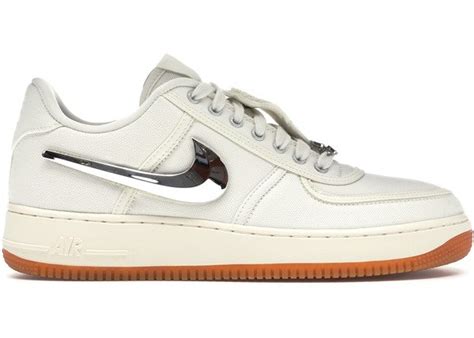 The shoe features a white canvas upper with a reflective trim, white midsole, and a classic gum rubber outsole. Nike Air Force 1 Low Travis Scott Sail - Best Ua Sneaker Shop