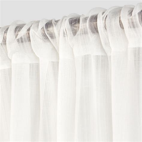The white curtain is patterned with gray stripes running vertically over the textured surface. Textured Sheer Curtain Panel White (42"x84") - Room ...