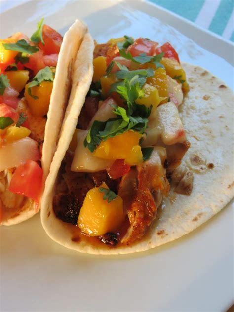 In a bowl, combine mango, the juice of ½ lime, red onion, red pepper flakes, fresh cilantro and a . Fish Tacos with Mango Peach Salsa | Recipe | Mango peach ...