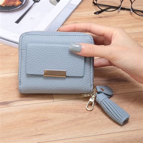 Our collection of card holders features the exclusive i am a plastic bag card case. Short Wallet Women Tassel Purse Women Wallets Female Small ...