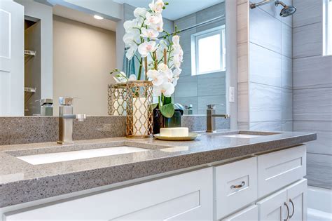 The contemporary bathroom with granite countertop, classic bathroom countertop design, grey countertop tiles idea, double vanity with brown granite, two toned bathroom with black granite countertop, black and white granite bathroom countertop, gold colour granite vanity top, double countertops with green granite, small bathroom with granite countertops, antique granite bathroom vanity are some of the designs that are used to adorn the bathroom interiors of modern bathrooms. What Are The Best Materials For Bathroom Vanity Countertops