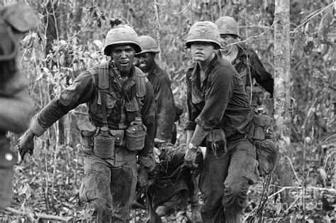 Carrying Wounded Comrade Photograph By Bettmann Fine Art America