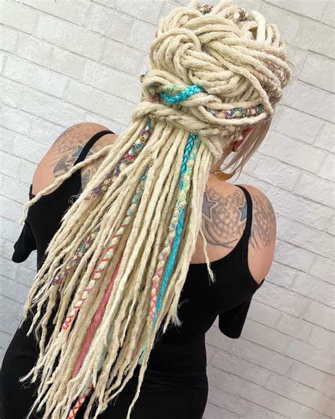 50 creative dreadlock hairstyles for women to wear in 2023 hair adviser dreadlock hairstyles