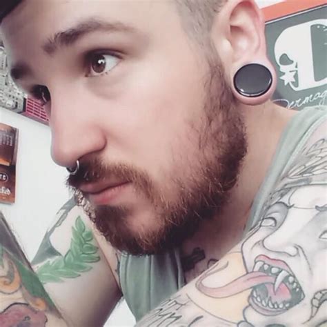 Septum Piercing And Stretched Ears