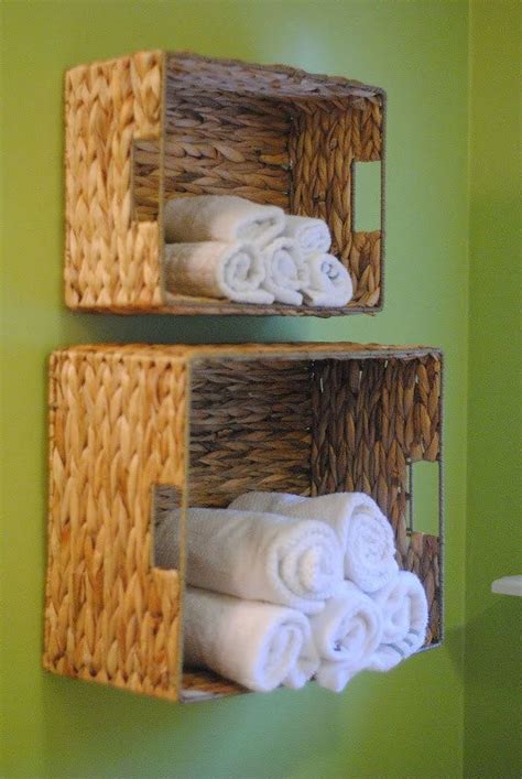 Hang Baskets On The Wall To Hold Towels In The Bathroom 31 Ways You