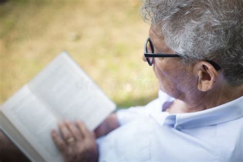 Older Man Reading Outside Stock Image Image Of Person 156998663