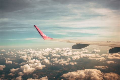 Free Images Sky Air Travel Cloud Airplane Airline Wing Daytime
