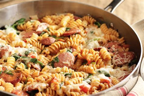This comforting addition adds in a smoked sausage and parmesan to kick it up a notch and make a traditional starter the main meal. Simple One-Pan Sausage Pasta Recipe