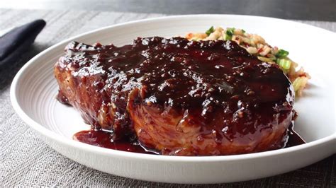 Food wishes with chef john. This sticky garlic pork chop recipe seems too good to be ...