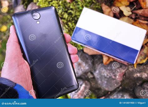 Modern Smartphone Based On The Android Operating System Stock Photo