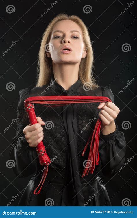 Beautiful Woman In Biting Red Whip Stock Photo Image Of Blond
