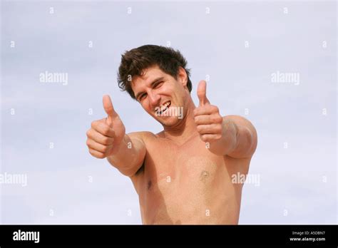 Man With Thumbs Up Naked Chest Stock Photo Alamy