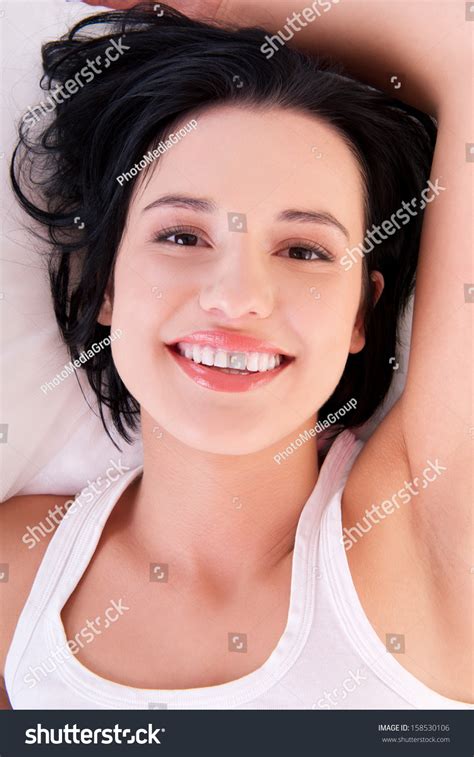 Стоковая фотография 158530106 Happy Sensual Young Woman Lying Bed Shutterstock