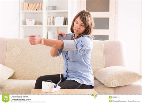 Woman Checking Her Blood Pressure Royalty Free Stock Image Image