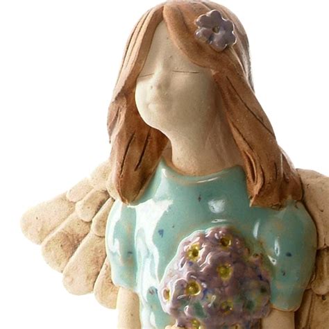 Joyful Ceramic Angel Figurine In Turquoise