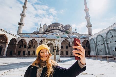 Premium Photo Young European Woman Takes A Selfie Portrait In