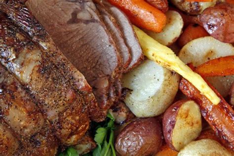 While the entire rib section comprises ribs six through 12, a standing rib roast may contain anywhere from two to seven ribs. A Christmas feast: Old English dinner features standing rib roast of beef and all the trimmings ...