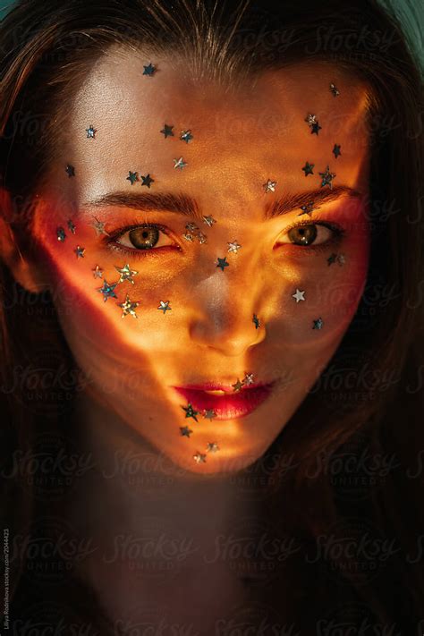 Headshot Portrait Of Amazing Girl With Silver Stars On Her Face By Stocksy Contributor Liliya