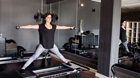 Stretching The Limits At Reformer Pilates With A Movable Torture Rack