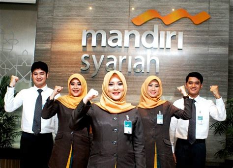 Desain baju seragam bank mandiri cabang ketapang ini menggunakan perpaduan warna hitam dan biru muda. Bank Mandiri segera jual bank syariah dan multifinance