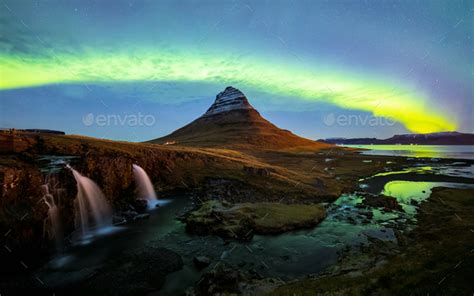 Northern Light Aurora Borealis Over Kirkjufell Mountain In Iceland