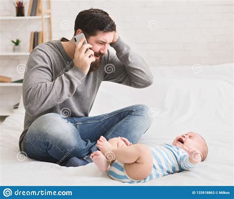 Worried Young Father With His Crying Baby Stock Image Image Of
