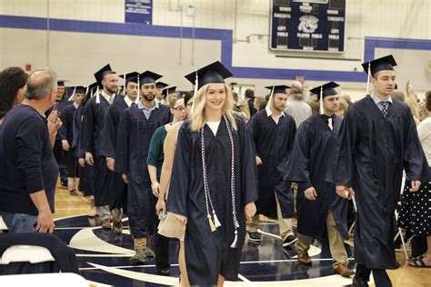 Penn State graduates walk across the stage throughout Pennsylvania
