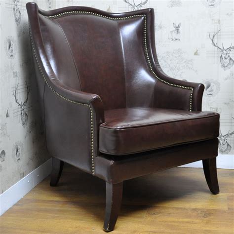Strictly speaking, armchairs are simply chairs that feature armrests. Brown Leather Studded Wing Chair | Leather wingback chair ...