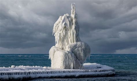 Lighthouse In Michigan Turned Into Giant Ice Sculpture After Being