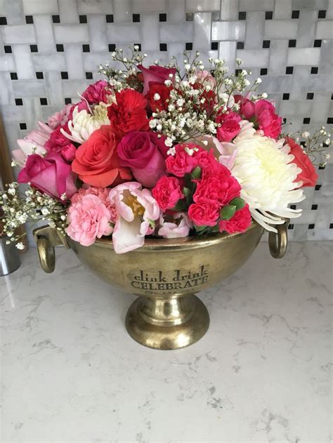 Flowers In A Champagne Bucket Champagne Buckets Dinner Party Centerpieces Home Candles