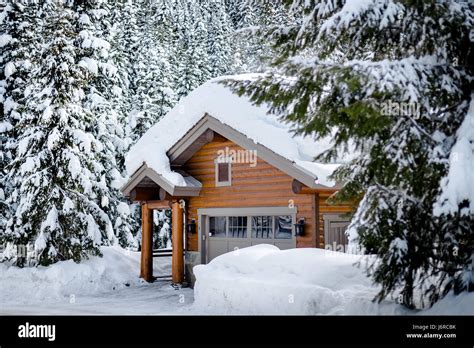Log Cabin In Snowy Woods High Resolution Stock Photography And Images