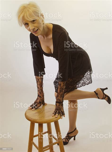 Female Senior Bending Over Stock Photo Download Image Now Istock