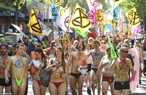 scantily clad extinction rebellion protesters bare it all as they take to the streets in